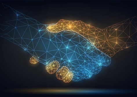 A glowing wireframe graphic of a handshake, to illustrate the Veris acquisition of Spatial Vision