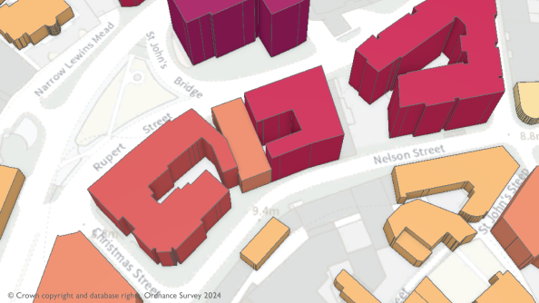 A colour-coded, overhead 3D visualisation of data showing the number of floors in some buildings.
