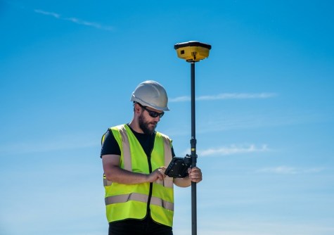 A man using the iCON gps 160 rover for directional drilling work.