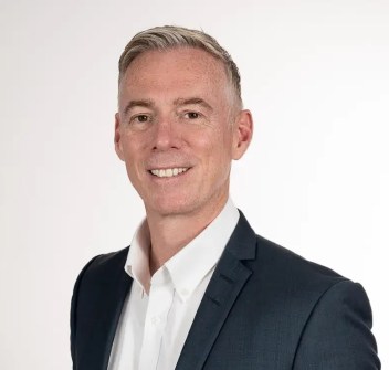 A head-and-shoulders photo of Mark Howells, Australian managing director of surveying company Plowman Craven.