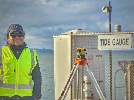 Tebetiraoi Inatoa completing levelling field work during the practical part of the hydrographic surveying training in Portland.