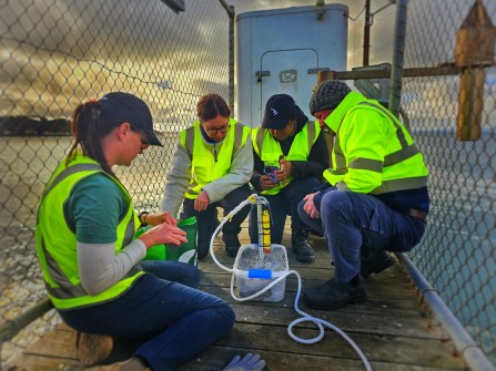Tebetiraoi Inatoa working on a tide gauge deployment during the practical part of the hydrographic surveying training in Portland.