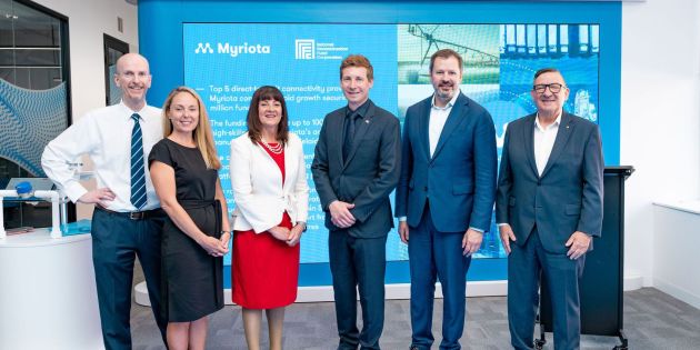 Six dignitaries standing in line at the announcement of the Myriota funding injection