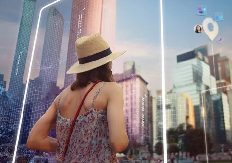 A montage image of a woman surrounded by city buildings. Supplied by Niantic Spatial.