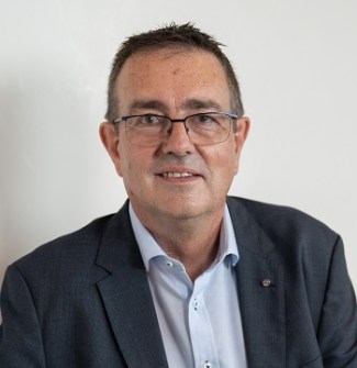 A head-and-shoulders image of Steve Jacoby, convenor of the combined FIG Working Week 2025 and Locate 24 geospatial conference