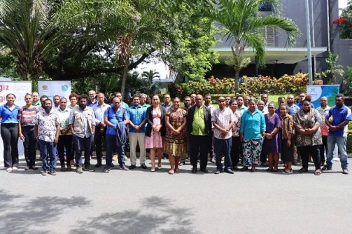 A group photo of 30-plus peoples who took part in the geospatial analysis of seagrass and mangrove ecosystems workshop.