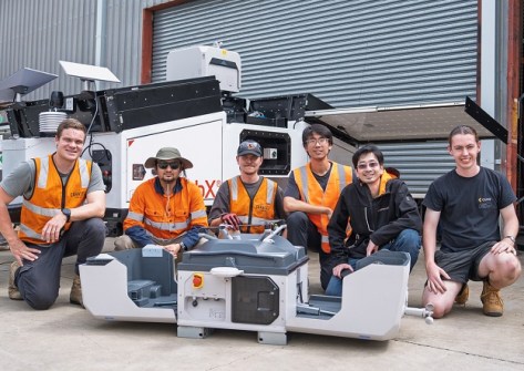 Members of the Sphere Drones team with a HubX
