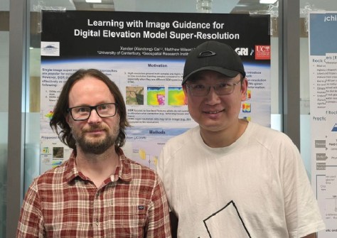 Flood-risk researchers, Matthew Wilson and Xiandong Cai, standing side by side