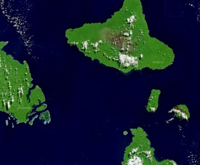 A satellite image of three central islands of the Vanuatu archipelago, with bright green landcover contrasting with the blue of the ocean