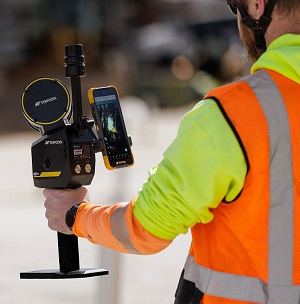 A man holding the Topcon CR-S1 handheld scanner