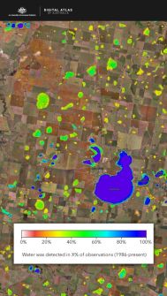 A satellite image of the area around Wickliffe, overlaid with green and blue spots corresponding to water observations made from Landsat data