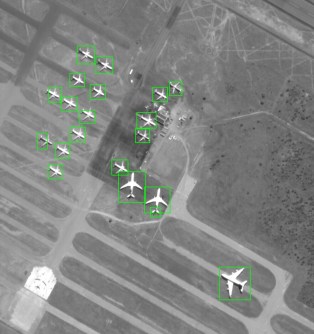 A satellite image of Alice Springs airport, showing green boxes around aircraft that were detected by the on-board AI system