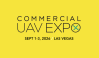 Commercial UAV Expo logo, white letters on a bright yellow background