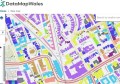 A DataMapWales screenshot showing an overhead-view map of streets, with buildings marked in different colours