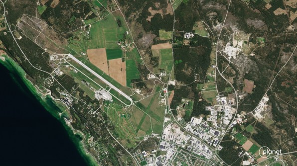 A Pelican satellite image of Gotland, showing green fields, buildings and an airport