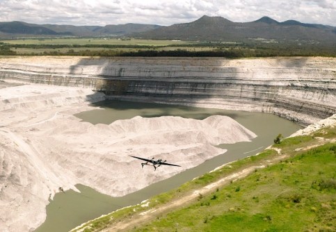 A Carbonix drone conducting a survey over a mine