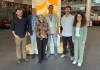 Six people, including three bursary recipients, standing together