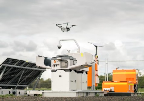 A RocketDNA drone taking off from is storage box