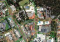 An aerial view of a suburb, with footpaths marked in colours as a mobility map