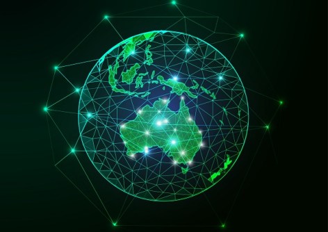Futuristic green Australia map continent on planet Earth view from space abstract background.